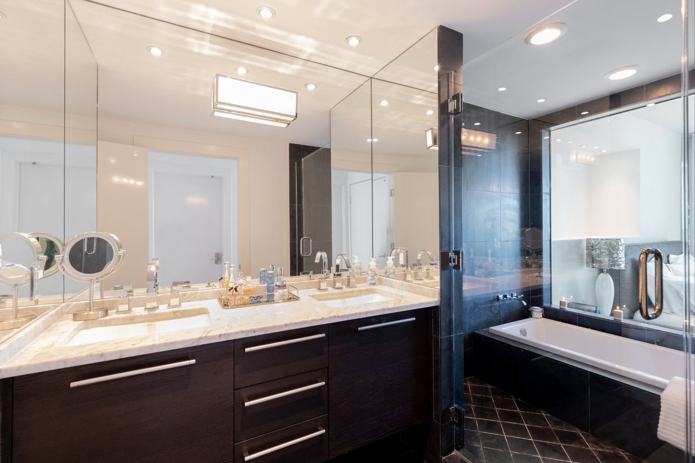 Double vanity with marble top and glass shower enclosure, Glen Cove NY