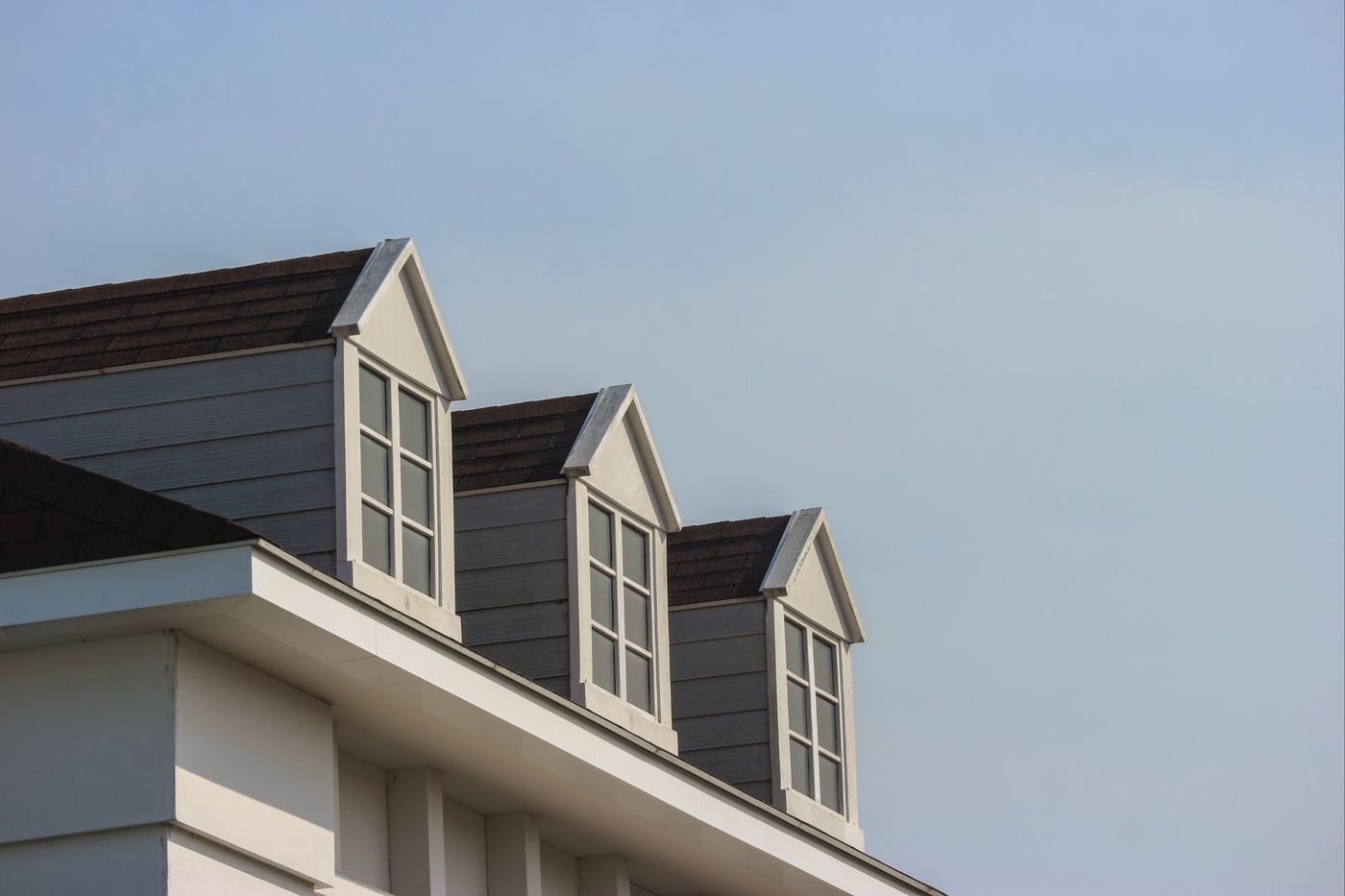 Row of gable dormers on a new shingle roof, Glen Cove NY