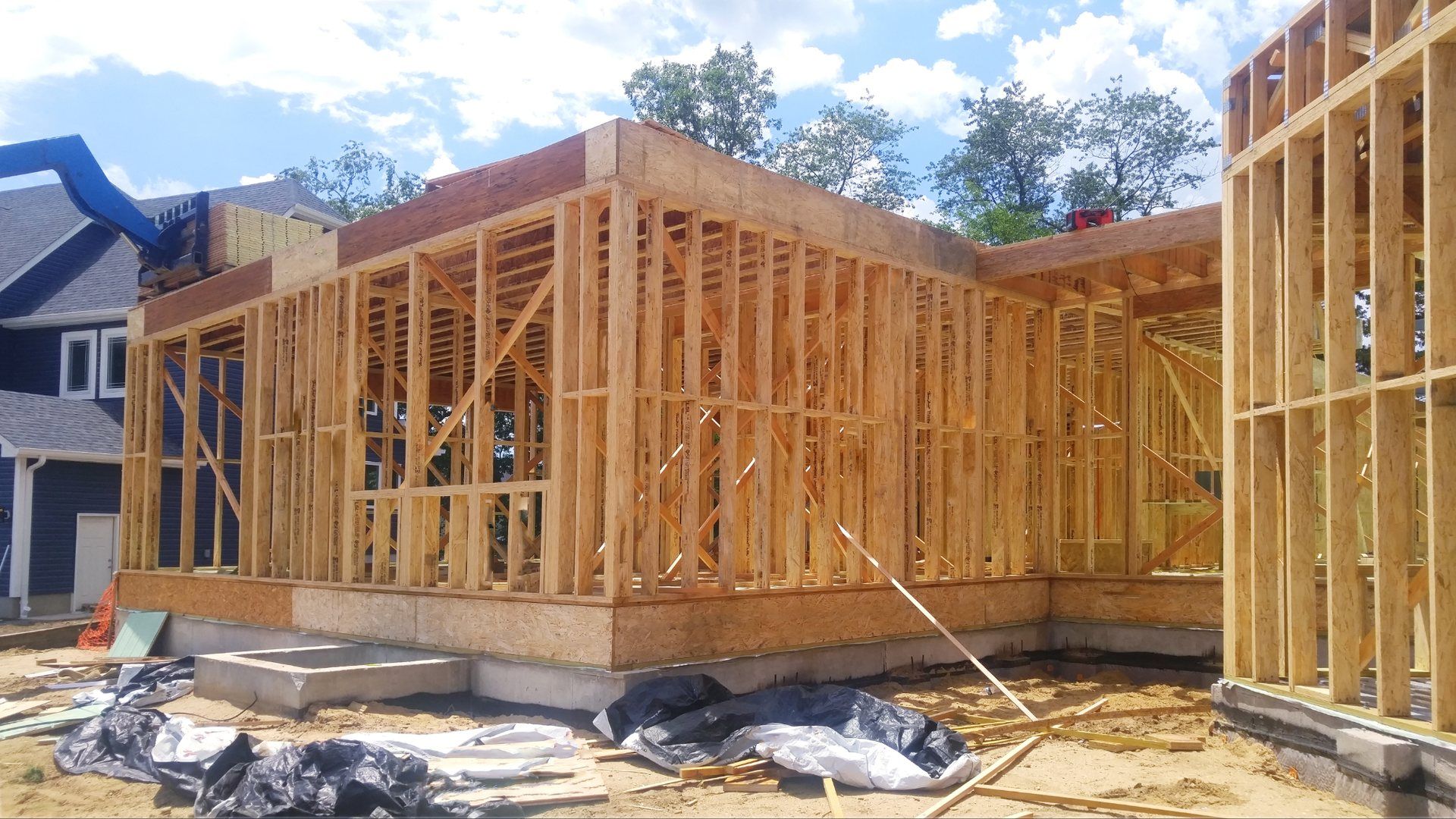 Home addition framed on a new foundation, Glen Cove NY
