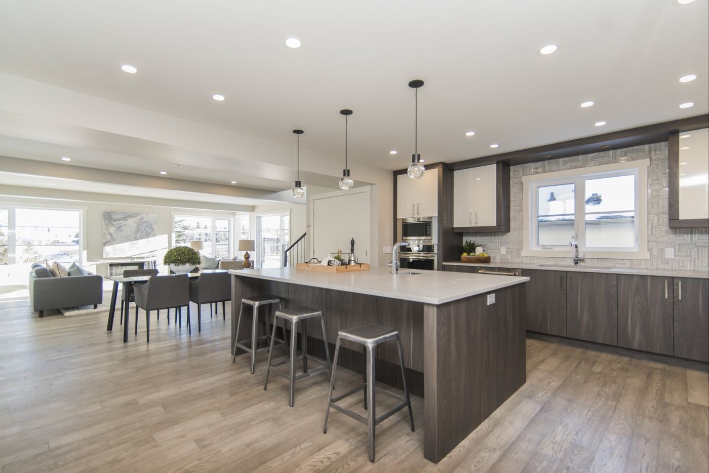 Open-plan kitchen and living area with large island, Glen Cove NY